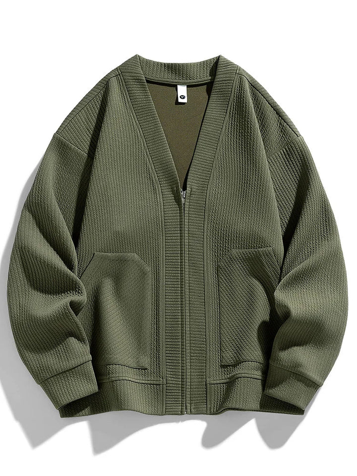 Soft knit men's winter cardigan with a zip closure, offering cozy warmth & stretch for daily wear.