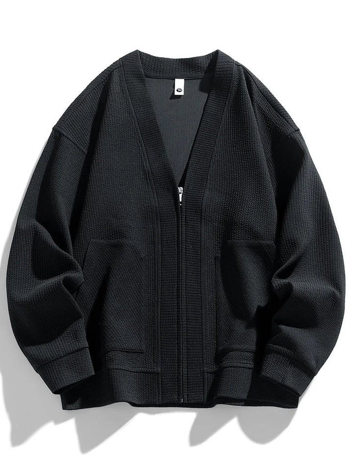Casual men's zip-up winter sweater, ideal for layering; features a comfortable stretch knit fabric.