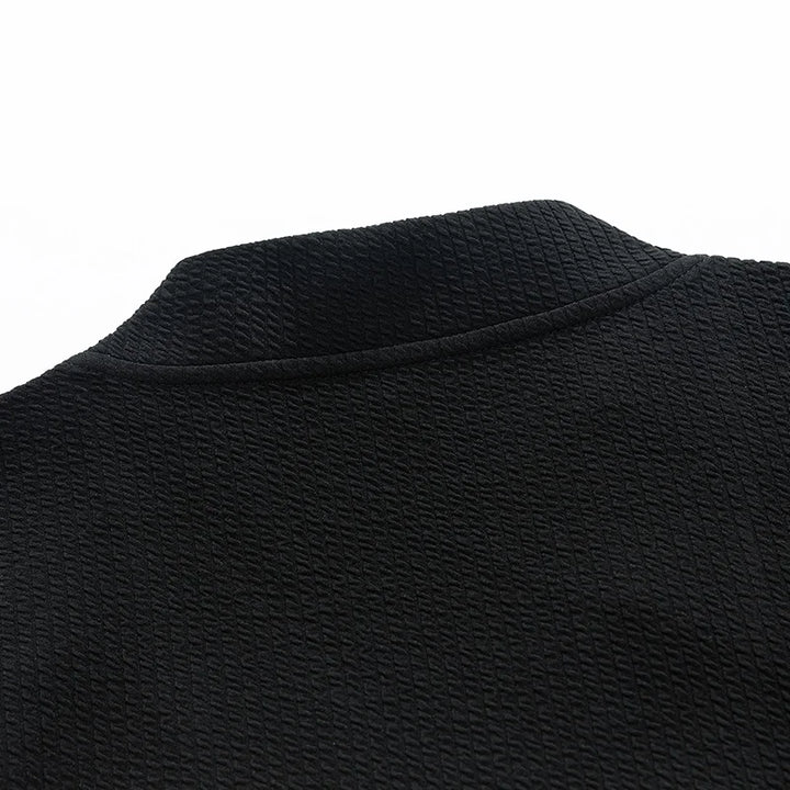 Textured knit men's zip-up sweater, designed for cozy warmth and comfortable stretch in winter.