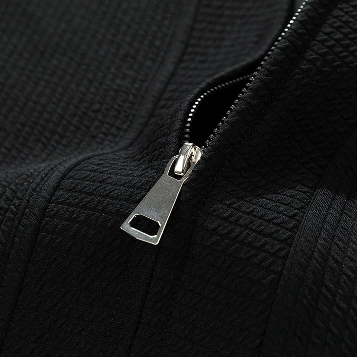 Comfortable men's stretch knit zip cardigan, offering a relaxed fit for everyday winter layering.