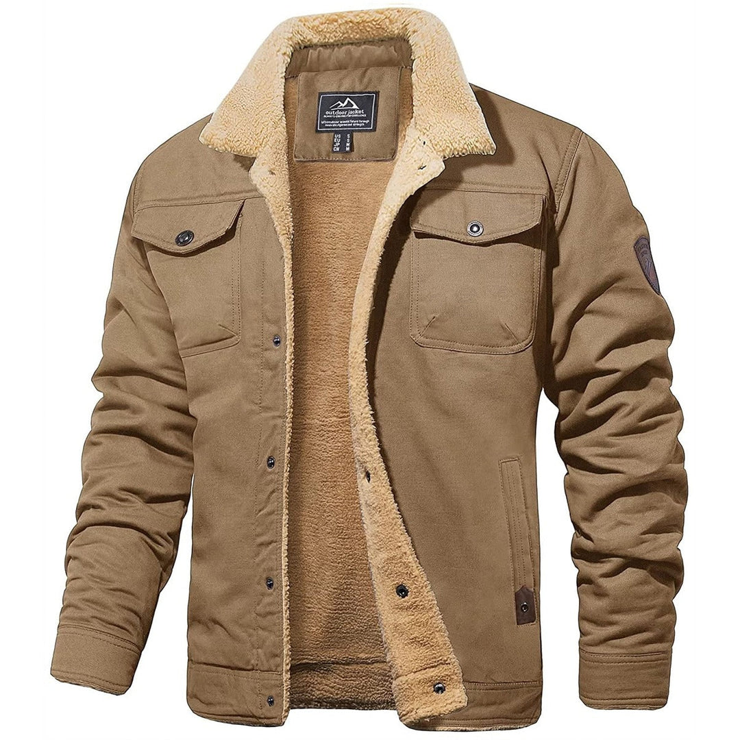 Man wearing men's warm winter jacket in an active outdoor pose. Insulated, stylish outerwear for cold weather comfort.