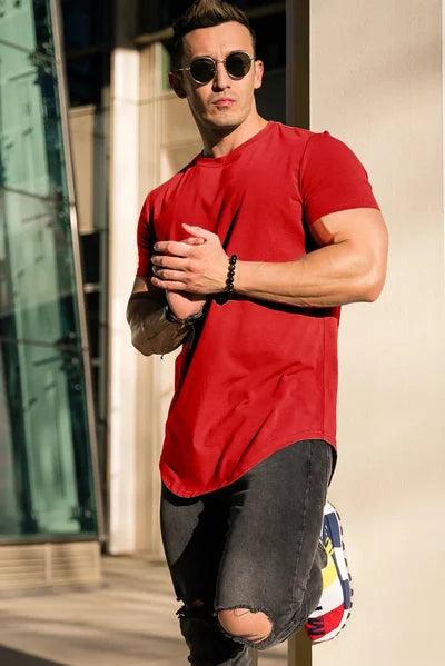 Athletic men's deep cut top, short sleeve, designed for active and everyday wear.