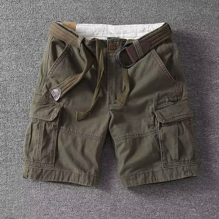 Men's utility cargo shorts featuring multiple deep pockets & adjustable waist for everyday comfort & rugged style.