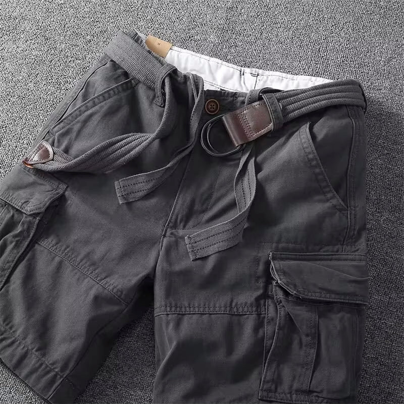 Men's durable utility cargo shorts, multiple pockets, adjustable waist. Perfect for outdoor or casual summer wear.