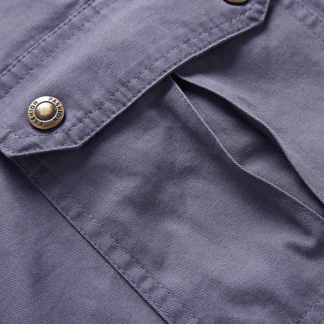 Stacked durable men's tactical cargo shorts, comfortable for summer outdoor adventures.