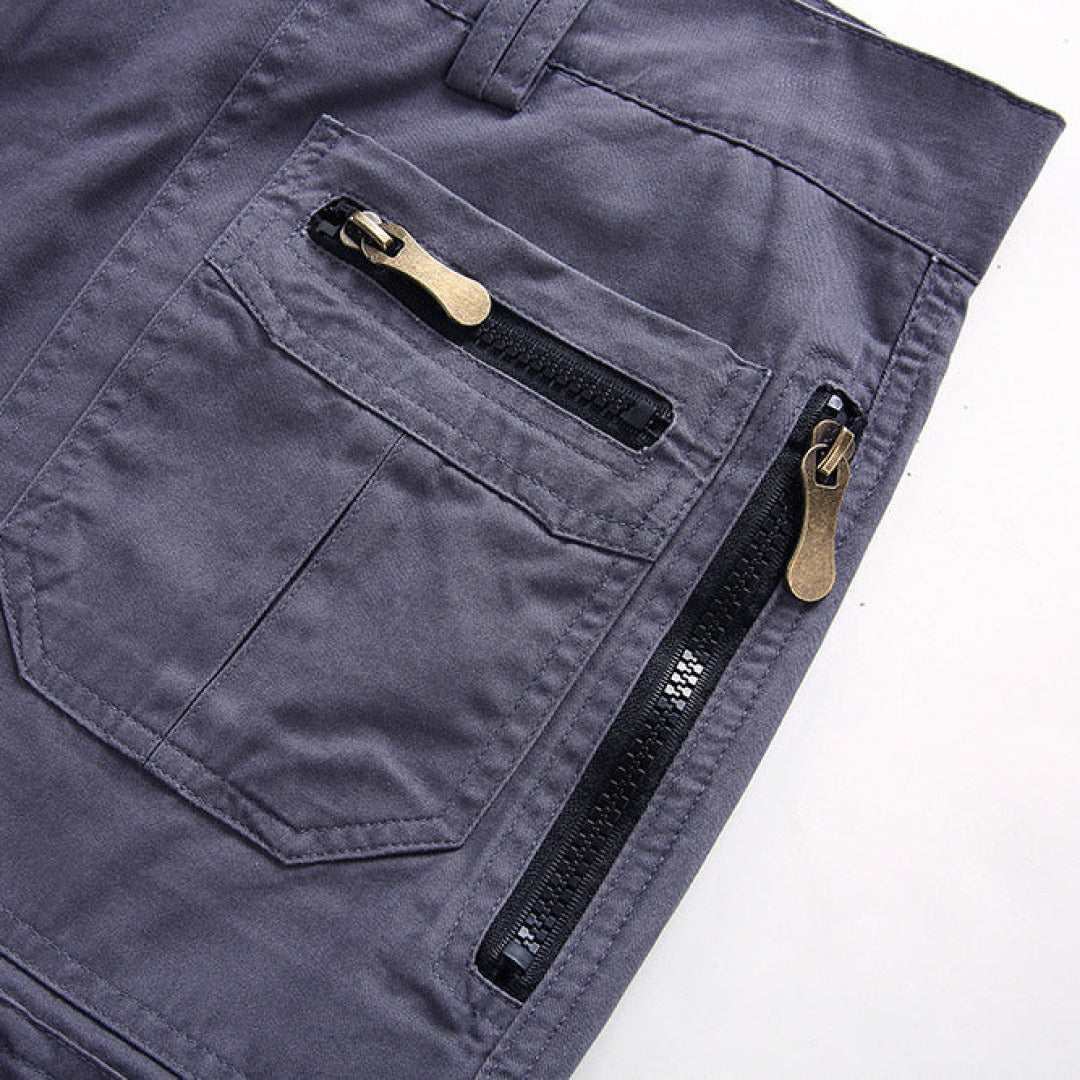 Active man wearing durable tactical cargo shorts, perfect for hiking and outdoor adventures.