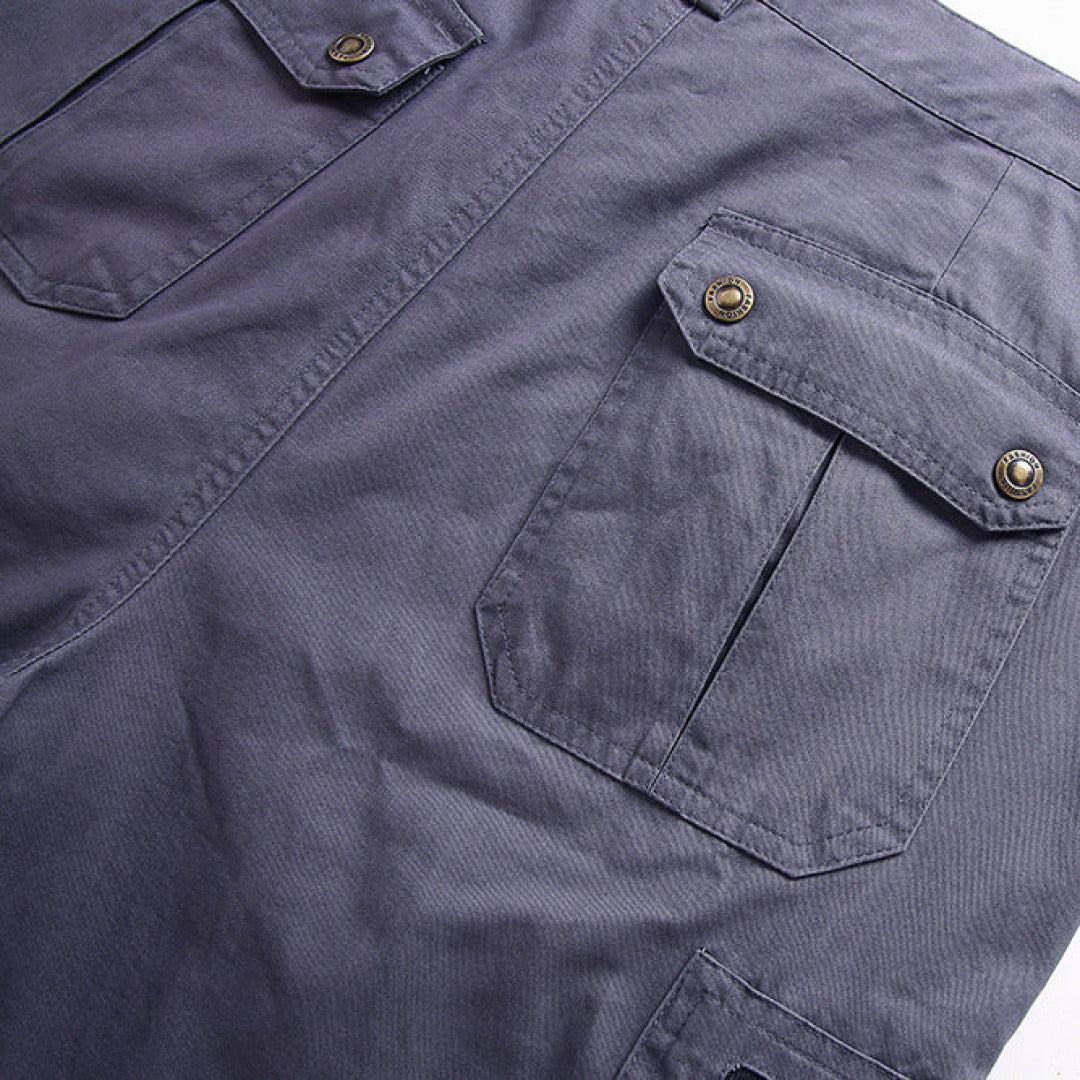 Close-up: Men's tactical cargo shorts showing ample, secure multi-pockets for essentials.