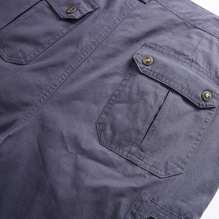 Close-up: Men's tactical cargo shorts showing ample, secure multi-pockets for essentials.