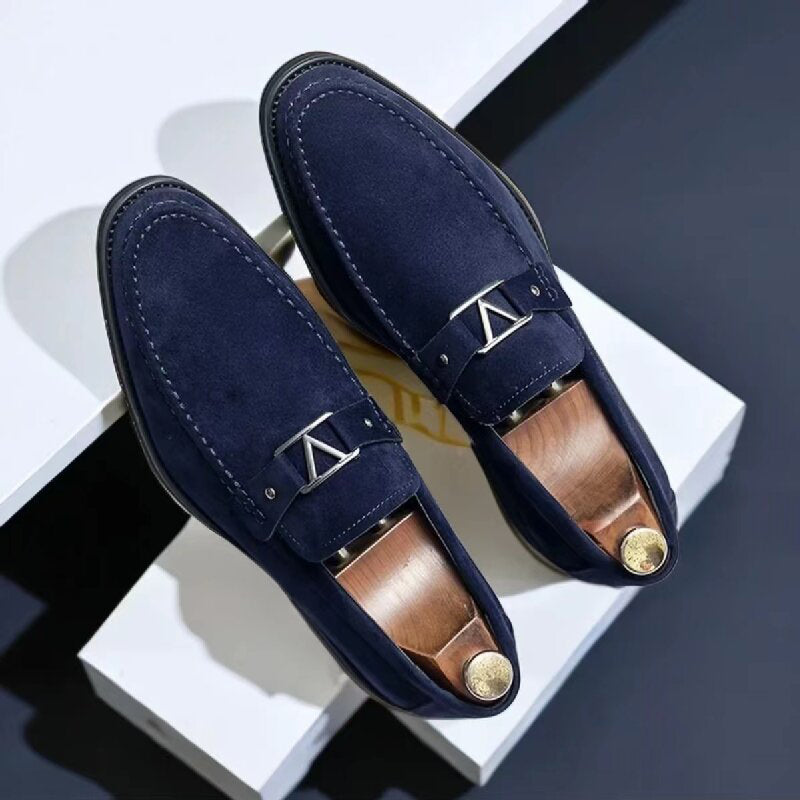 Sleek men's formal slip-on loafers featuring a distinguished metal bit, great for professional attire.