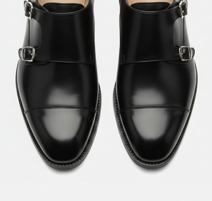 Classic Italian style men's leather loafers. Elegant Milano silhouette slip-on shoes for formal wear & business fashion.