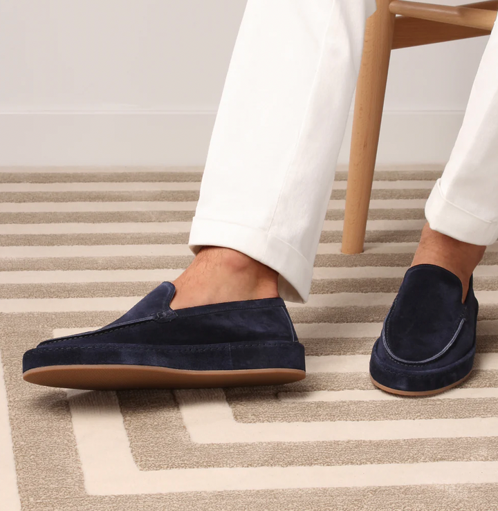 Comfortable men's beige slip-on loafers, ideal for smart casual and everyday fashion.