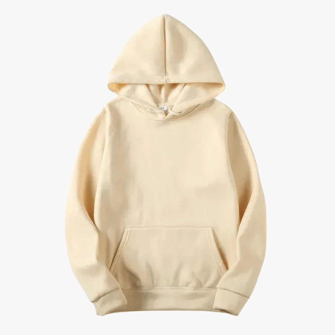 Man wearing a cozy men's essential hoodie, showcasing its relaxed fit and comfort.