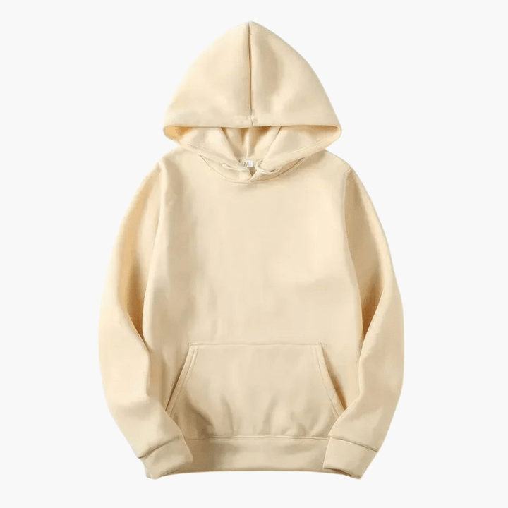 Man wearing a cozy men's essential hoodie, showcasing its relaxed fit and comfort.