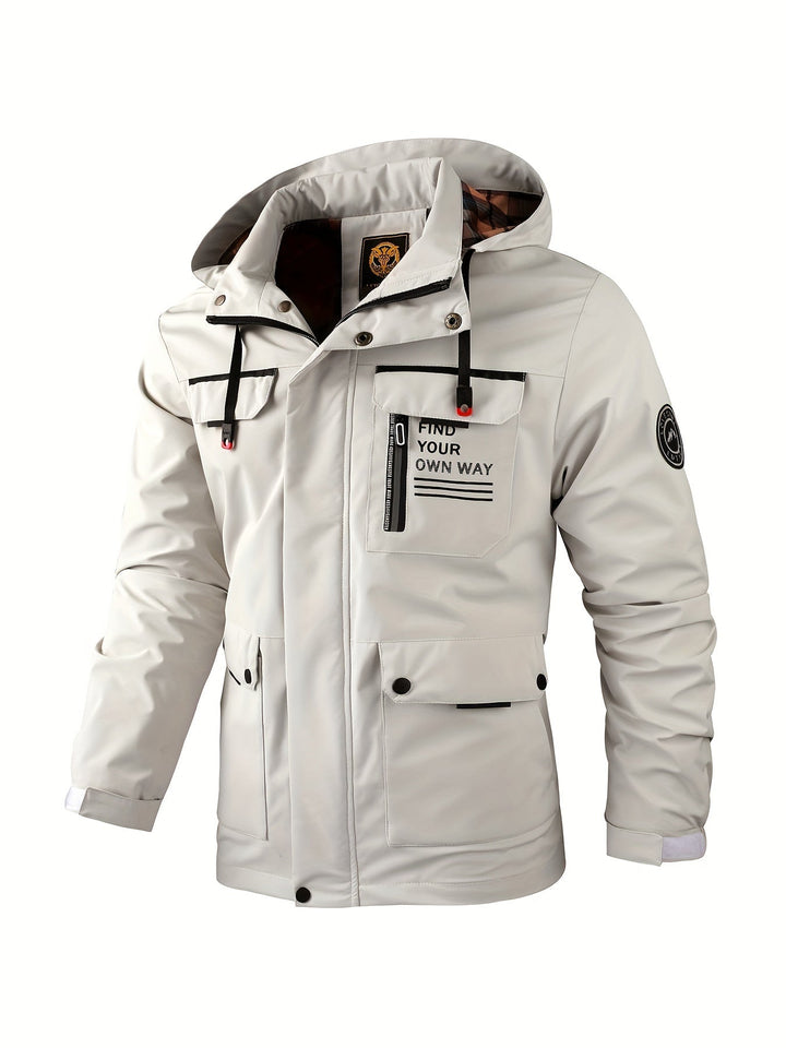 Men's evergreen weatherproof outdoor jacket for winter. Waterproof, windproof, hooded adventure wear.