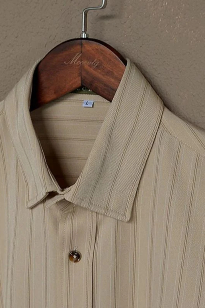 Stylish men's tailored fit dress shirt with stripes, ideal for business and smart casual.
