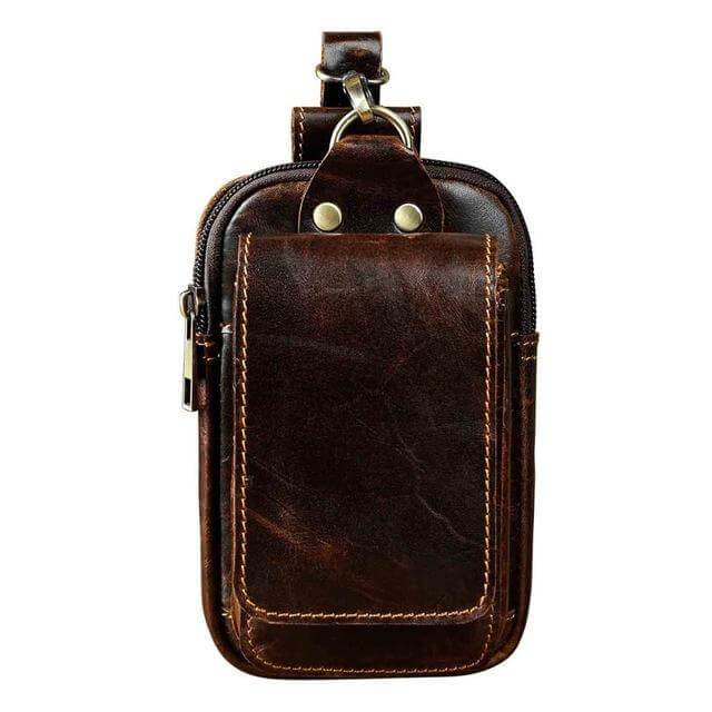 Essential men's travel bag: genuine leather waist pack in dark brown, secure & stylish for adventures.