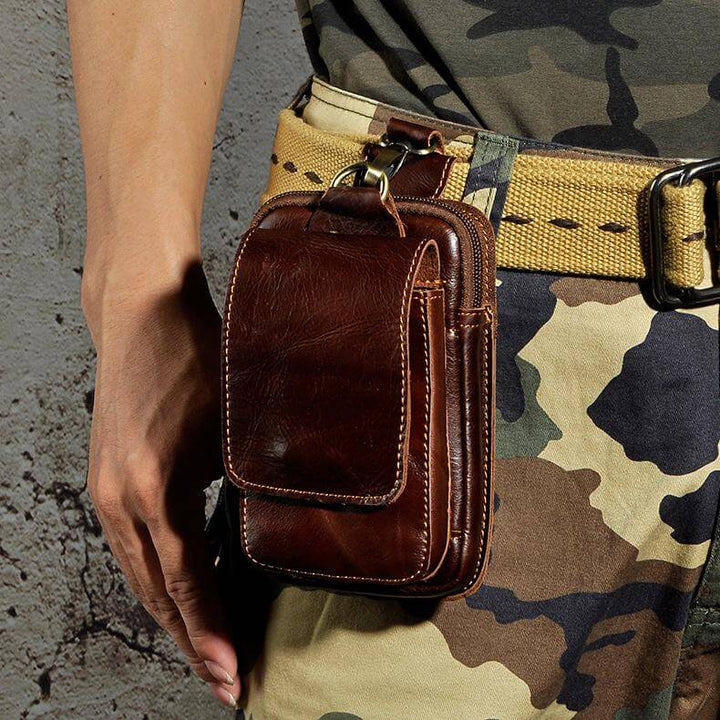 Premium men's genuine leather waist pack, durable dark brown belt bag for secure everyday items.