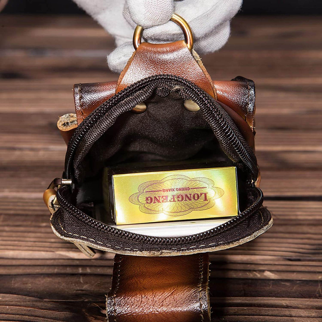 Compact men's genuine leather waist pack, ideal for secure storage of daily essentials, travel-friendly.