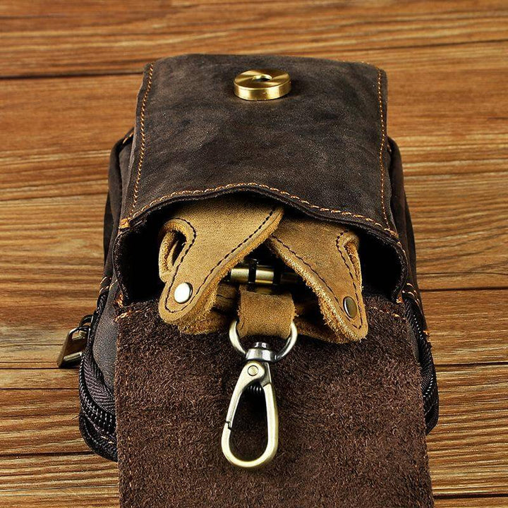 Man wearing a dark brown genuine leather waist pack, offering hands-free everyday carry for essentials.