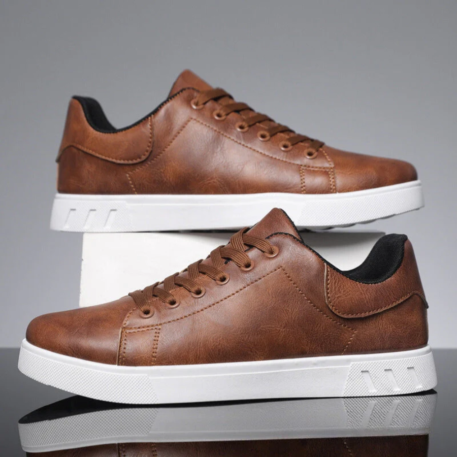 Modern men's lace-up sneakers, featuring a comfortable low-top design for casual daily wear.