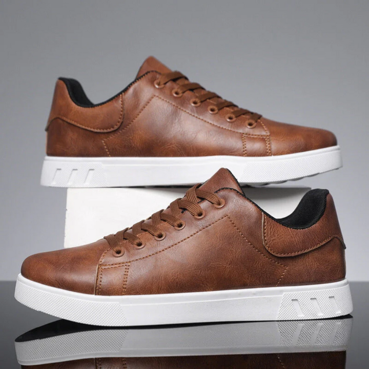 Modern men's lace-up sneakers, featuring a comfortable low-top design for casual daily wear.