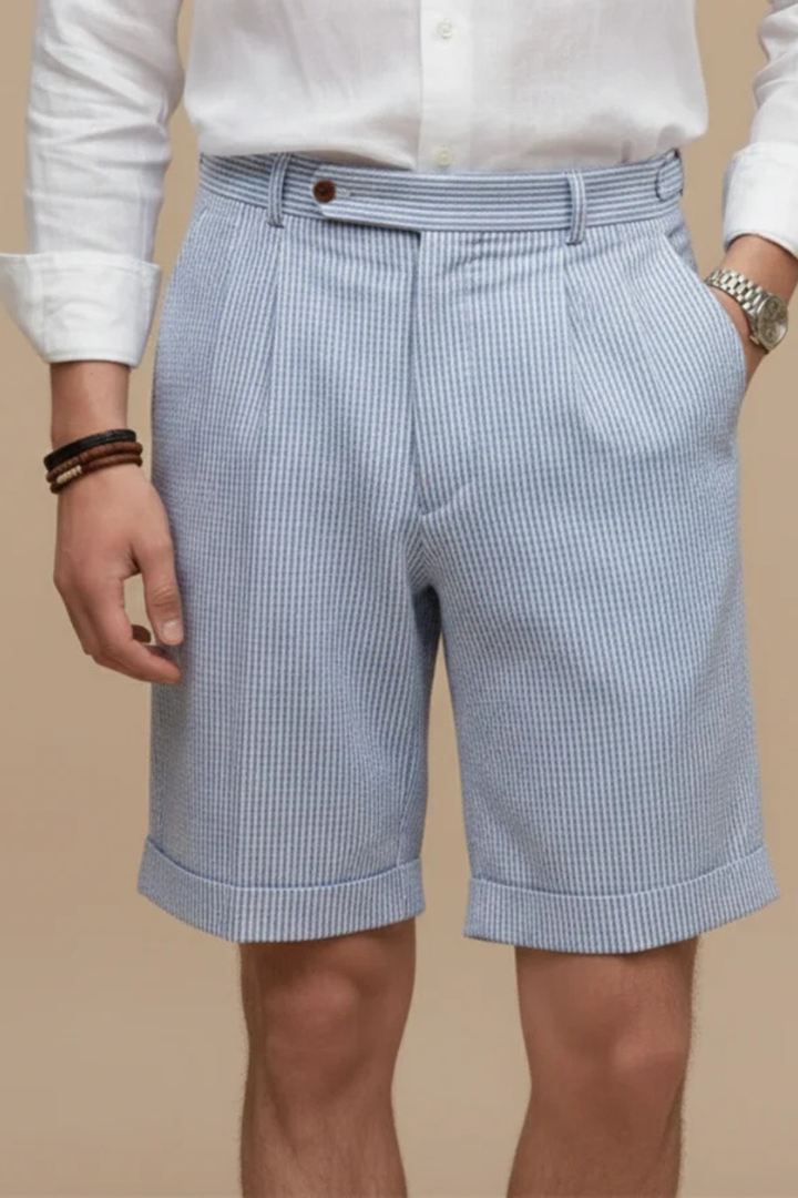 Striped men's chino shorts with a flattering high waist and unique pleated turn-up hem, great for summer fashion.