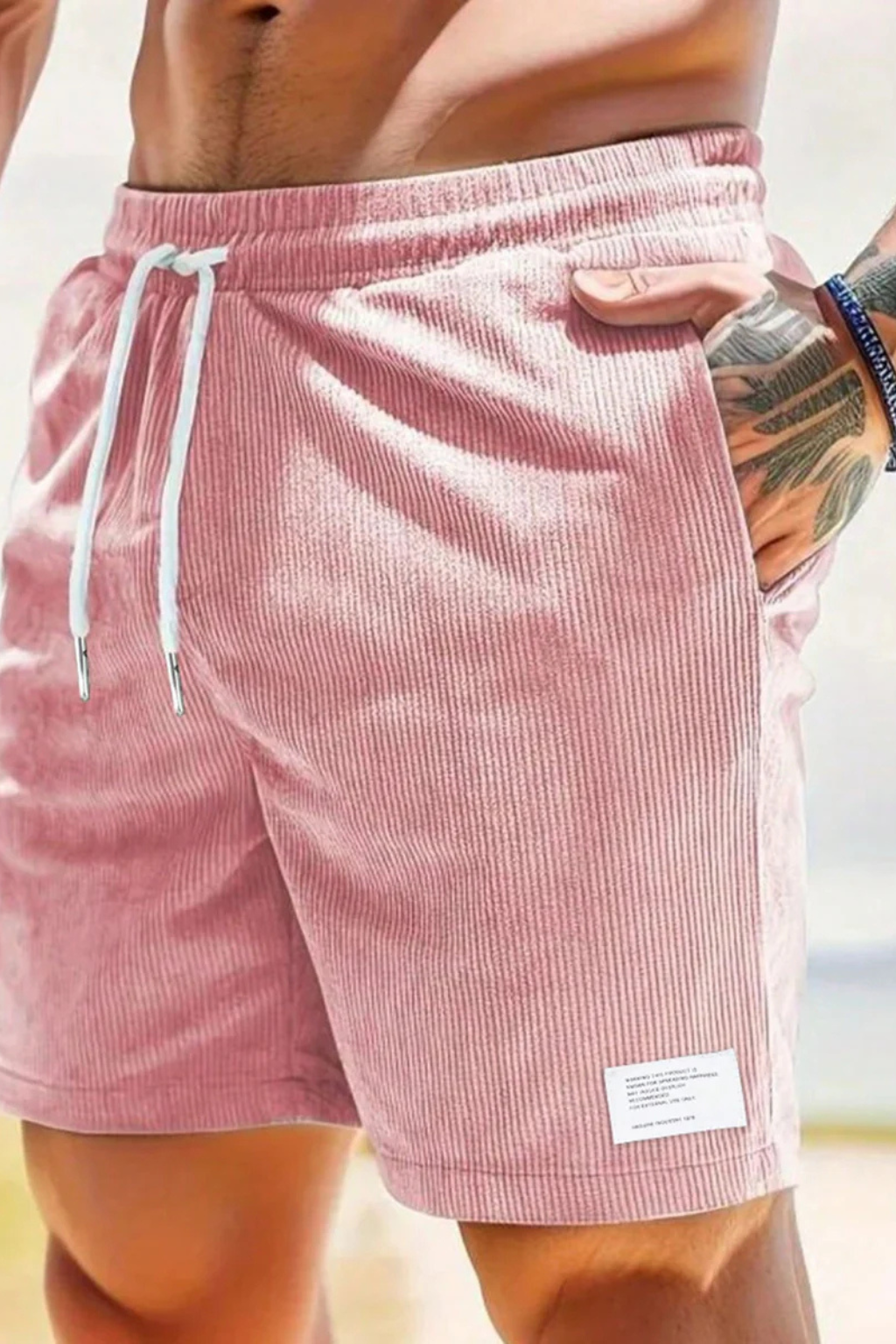 Men's high waist striped pleated shorts, tailored for a smart summer casual look.