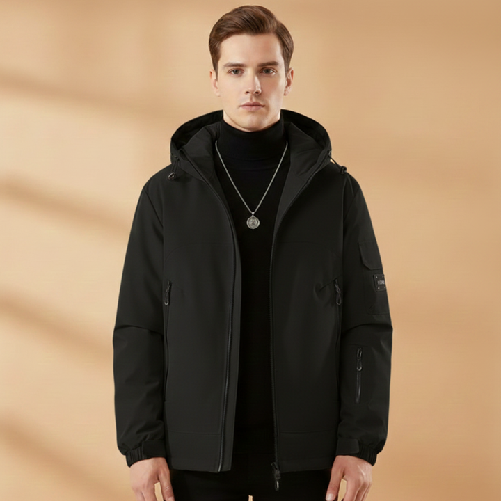 Rugged men's insulated ski jacket with hood. Durable outdoor gear for cold weather, skiing & alpine adventures.