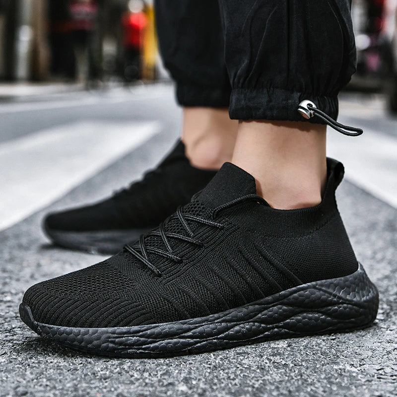 Modern men's breathable trainers. Lightweight cushioned sneakers ensuring comfort for all-day wear.