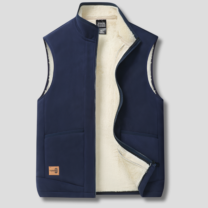 Men's lined winter vest in charcoal, perfect for warm layering in cold weather. Stylish insulated outerwear.