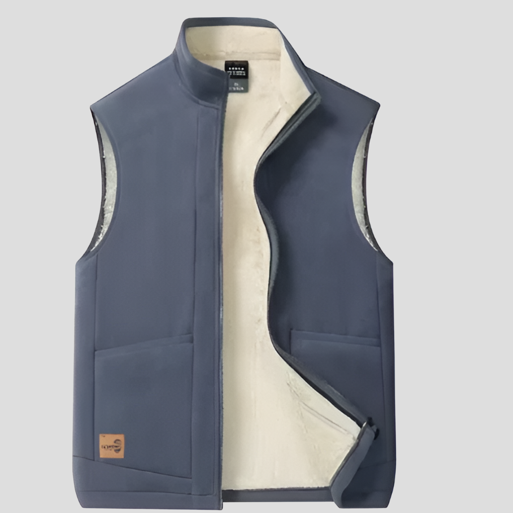 Stylish men's insulated vest, ideal for fall fashion & casual layering. A warm, modern winter outerwear piece.