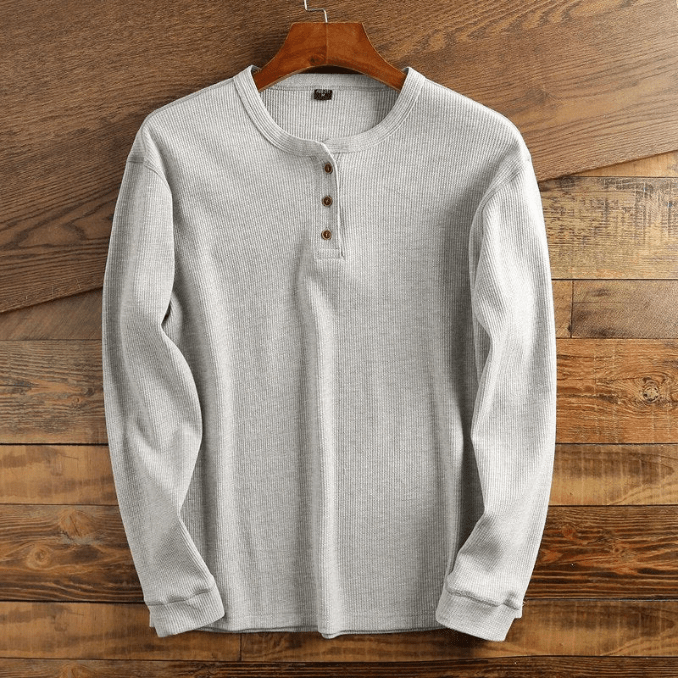 Men's long sleeve waffle knit Henley shirt, a comfortable and stylish casual top.