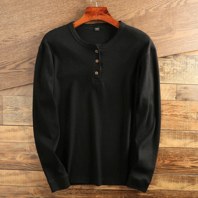 Versatile men's waffle knit Henley, long sleeve, perfect for layered modern casual looks.