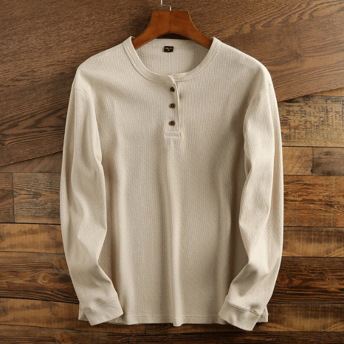 Warm men's waffle knit long sleeve Henley, ideal winter shirt or spring casual top.