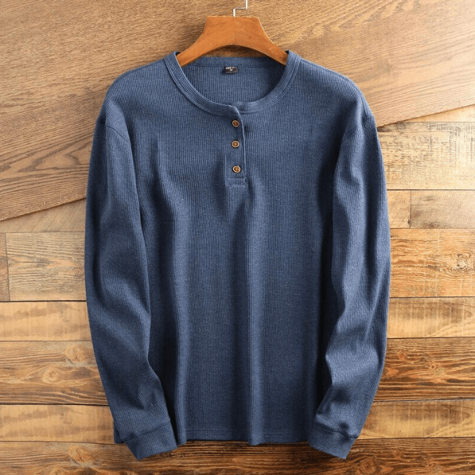 Stylish men's waffle knit Henley shirt, long sleeve, a comfortable textured fashion top for men.