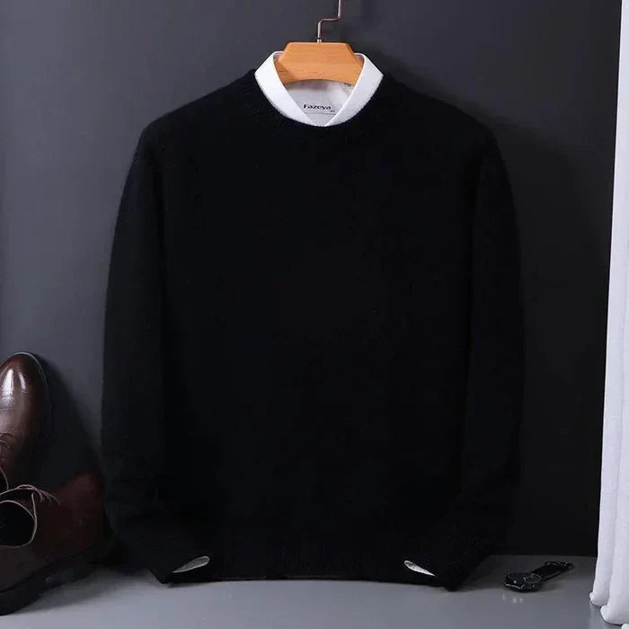 Men's loose fit knitwear pullover in a timeless style for comfortable, versatile casual wear.