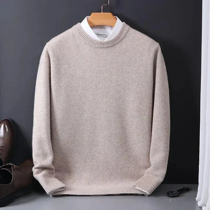 Close-up of a men's loose fit winter sweater, showing its comfortable knit texture and timeless casual pullover style.