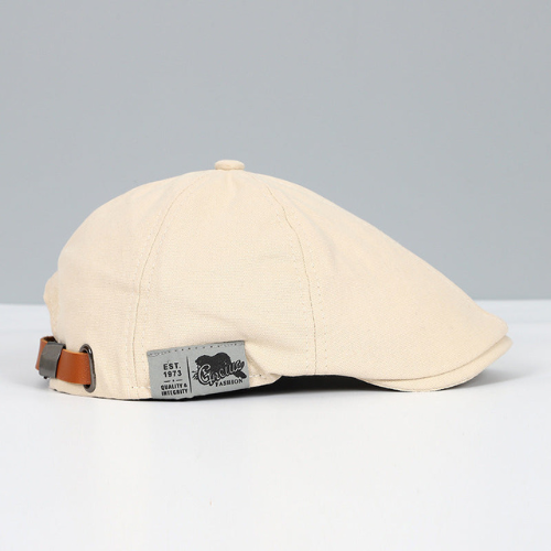Classic men's beret, an adjustable unisex hat for both casual & formal wear. Elegant headwear.