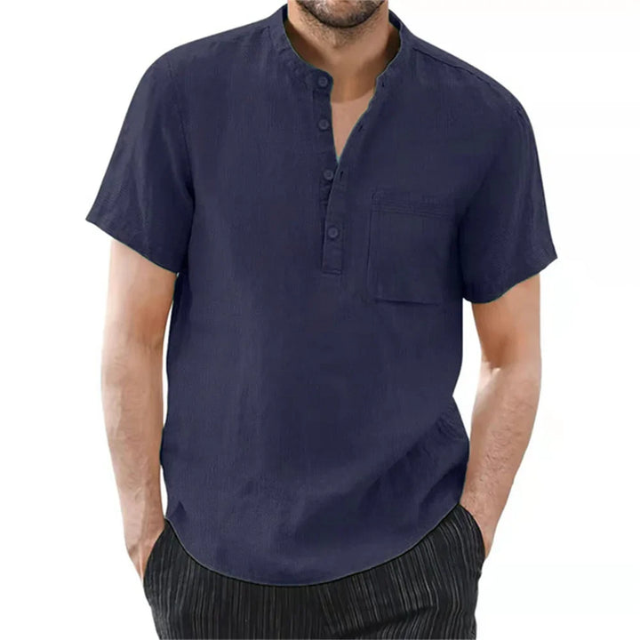 Tan men's casual short sleeve shirt featuring a sleek band collar. Breathable & modern for summer.