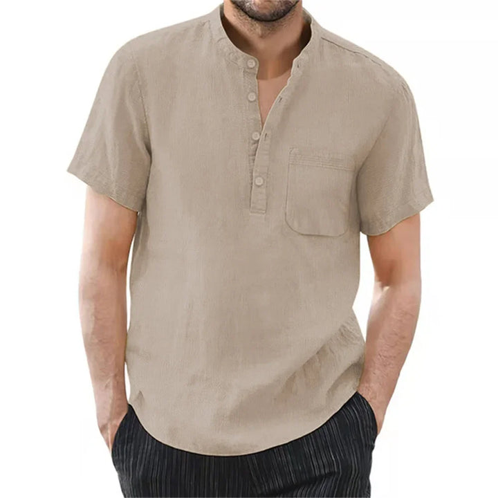 Blue relaxed fit men's band collar shirt with short sleeves. Perfect for smart casual everyday wear.
