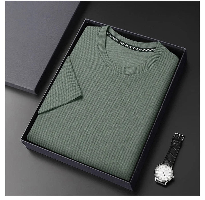 Modern men's waffle crew neck t-shirt, short sleeve and relaxed fit. Comfortable, versatile, and stylish for everyday men's fashion.