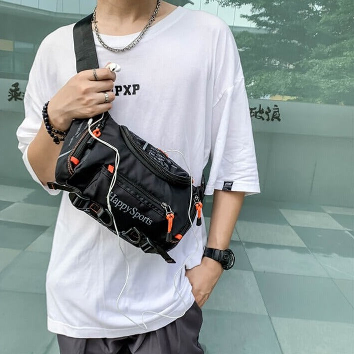 Black men's water-resistant sling bag, multi-way travel pack. Crossbody, waist bag for outdoor utility. Nylon.