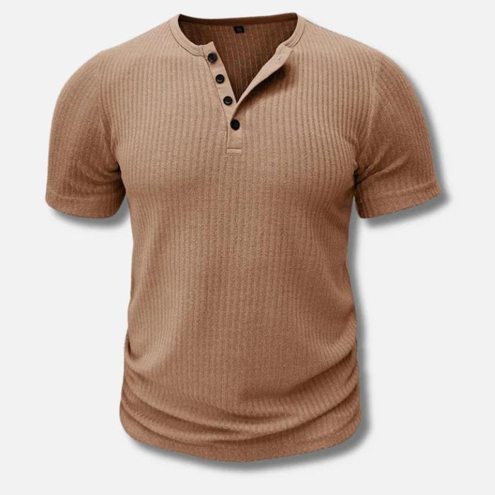 Stylish men's short sleeve muscle fit Henley. Features a contemporary ribbed texture for modern appeal.