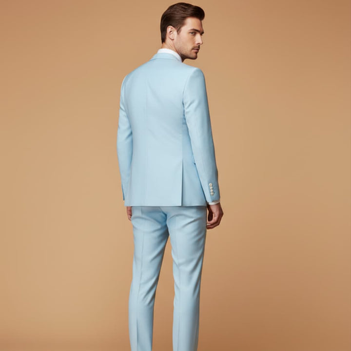 Close-up of premium fabric detail on a men's slim fit 3-piece suit jacket, luxurious formal event wear.