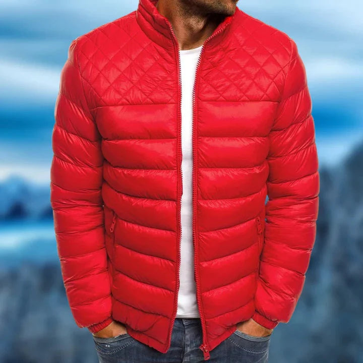 Warm men's insulated puffer jacket in a modern style. Perfect windproof, water-repellent outerwear for winter fashion.
