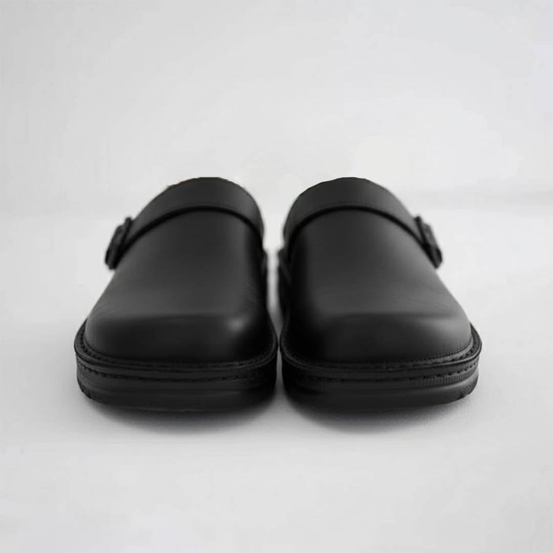 Ergonomic men's slip-on clogs providing orthopaedic arch support and lasting comfort.