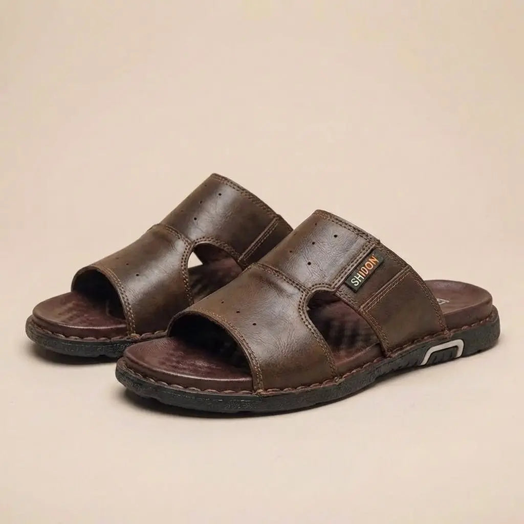 Slip into comfort with men's wide-fit orthopedic slide sandals, ideal for daily wear & foot health.