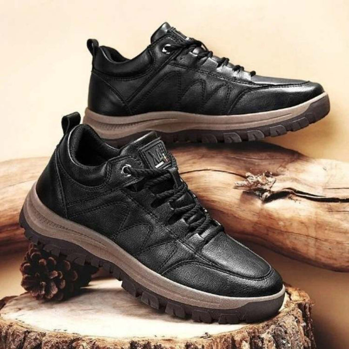 Side view of men's orthopedic walking footwear, showing supportive design and cushioned sole for stability.