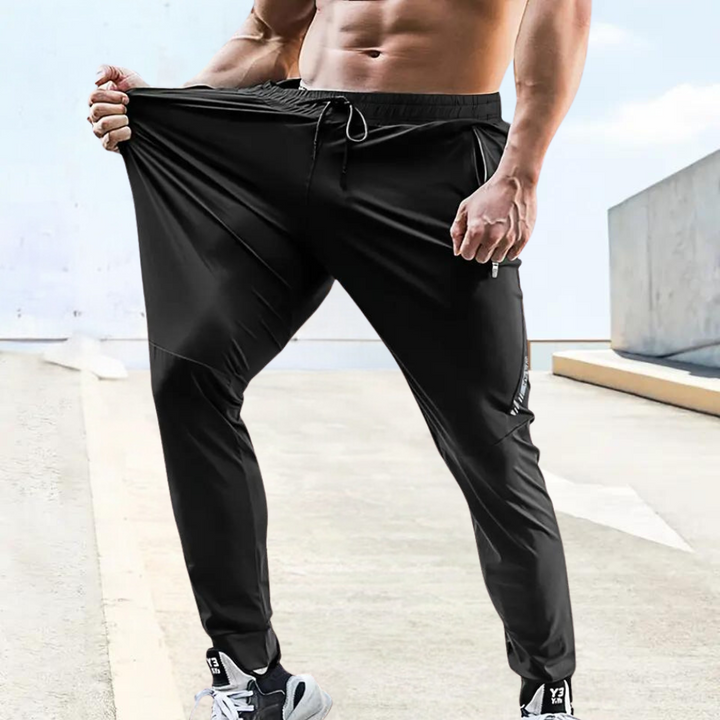 Stylish men's training trousers, providing lightweight comfort and flexibility for running, gym, and all active sports.