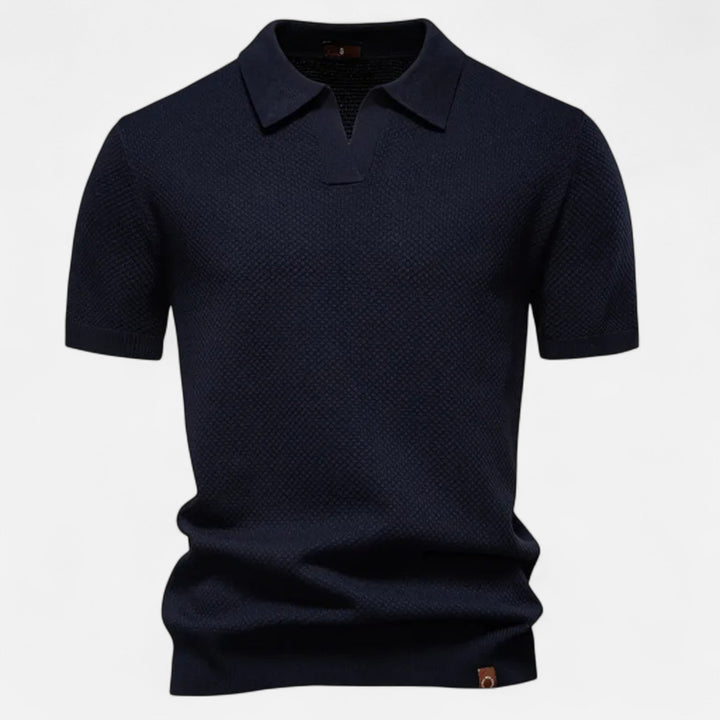 Soft men's pineapple polo shirt, short sleeve, offering timeless style & comfort for summer fashion.